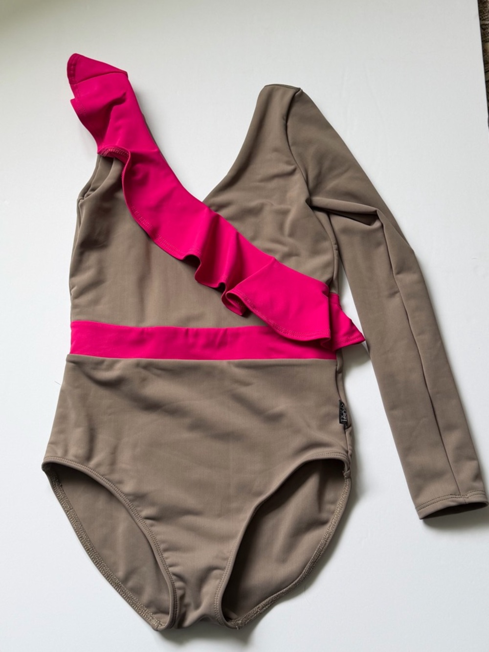 Tiger Friday AXS One-Shoulder Ruffle leotard in Taupe with Hot Pink Accent